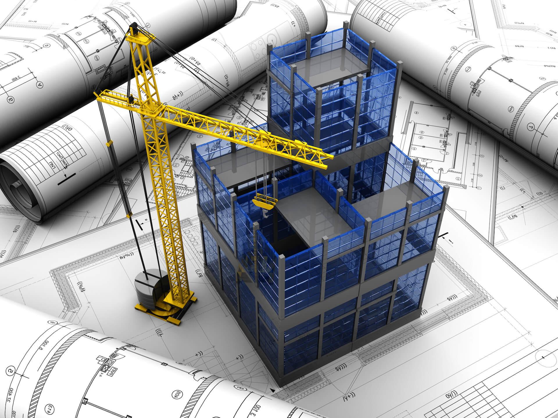 مهندسان عمران در حال بررسی نقشه‌های پروژه‌های زیرساختی